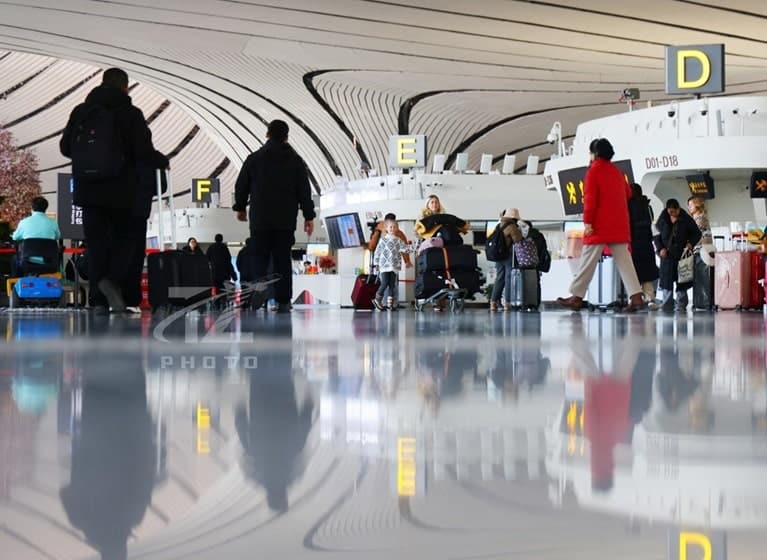 Passengers coming and going at Beijing Daxing International Airport