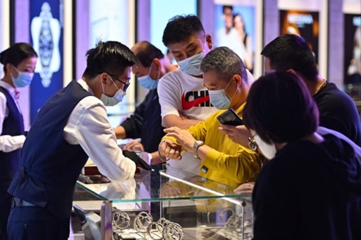 Wealthy Chinese consumers shopping at a luxury store